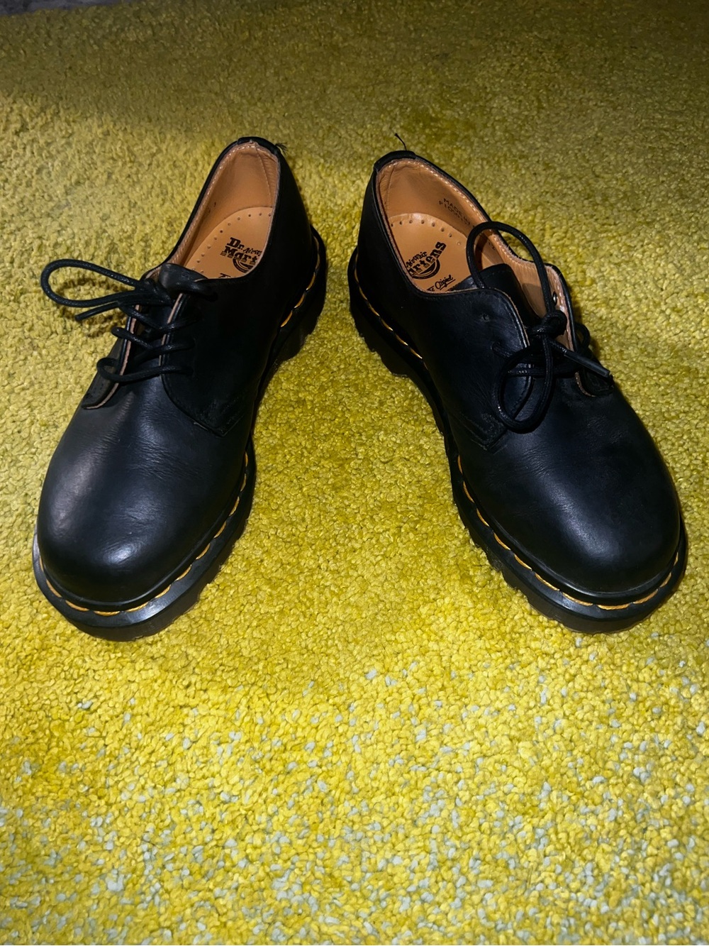 Dr. Martens 1461 oxford in black leather with yellow welt stitching